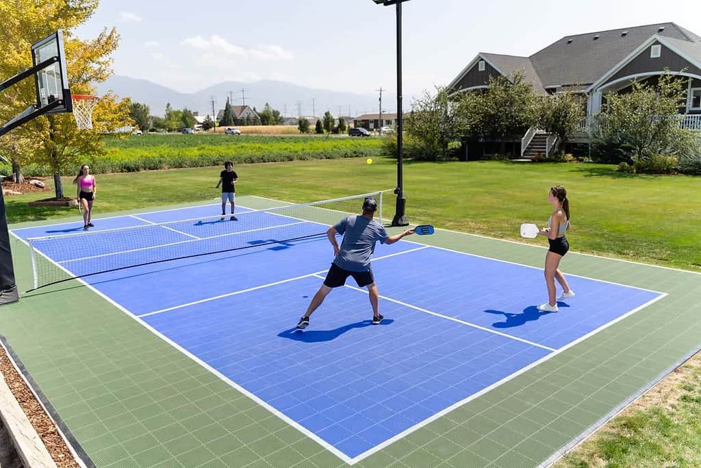 people on a pickleball court