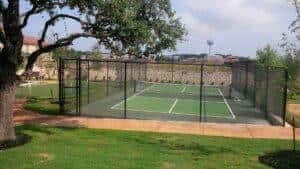 backyard pickleball court with fence