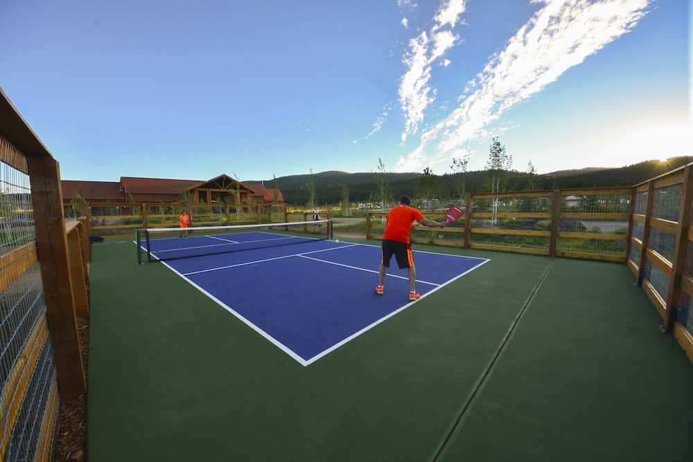 Angel Fire Resort, New Mexico view of two people playing pickleball
